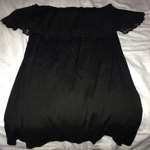 Black off shoulder dress.